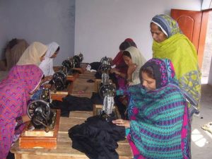 Women learning in the sewing center