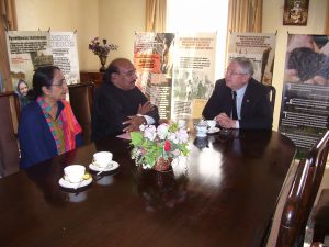 Fr. John and Pb. Rosy speaking with a diplomat